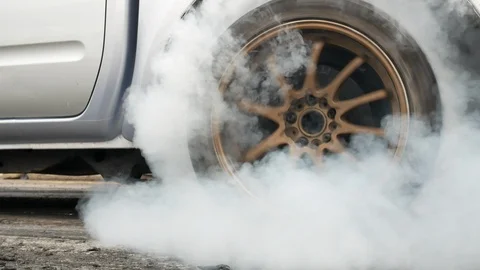 Drag car make tires warm up with smoke. Video stock 98096445