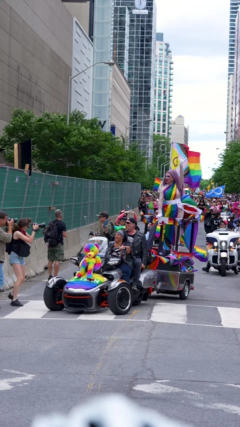 Drag Performer Waving Rainbow Flag on Pride Parade Float Toronto 스톡 동영상 332018050