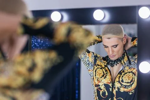 Drag queen performer getting ready in a dressing room. Stock Photos