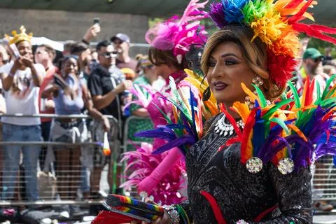 Drag queen in rainbow feather costume at London Pride parade. London, UK, 29 Stock Photos