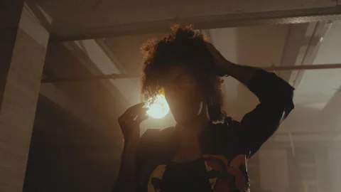 Drag queen stands and adjusts wig while chewing gum Stock Footage 275646371