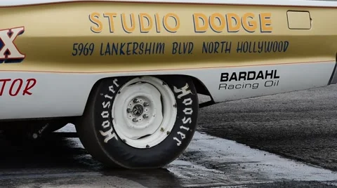 Drag racing driver warming up tyres at start of race, york raceway uk Stock Footage 64206984