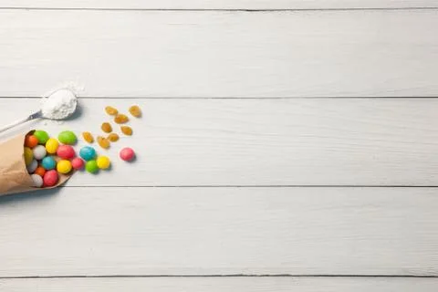 Dragee colored candy with raisins Stock Photos