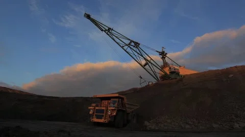 Dragline excavator loading dump truck Stock Footage 61851172