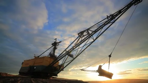 Dragline excavator at an opencast coal mining at sunset Stock Footage 61851047