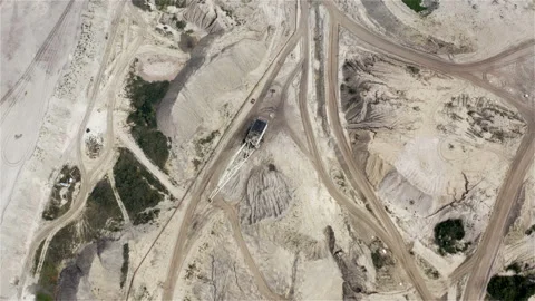 Dragline single bucket excavator with cable and block equipment on a sand pit Stock Footage 117734285