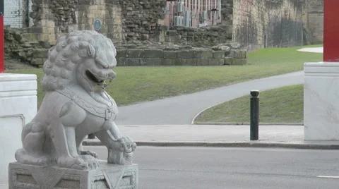 Dragon at base of gate to China Town in Newcastle, zoom out Stock Footage 1089743