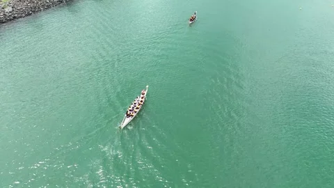 Dragon boat team practicing in the turquoise waters of Amador Panama Stock Footage 343904957