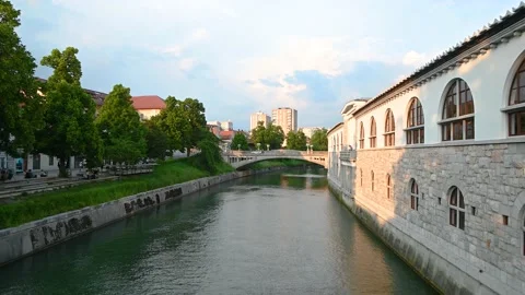 The Dragon Bridge spans over river Ljubljanica in old town Ljubljana, Slovenia Stock Footage 155881114