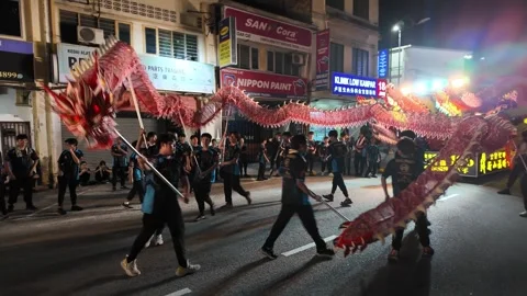 Dragon Dance Parade at Seng Fatt Temple in Kampar Stock Footage 345443965