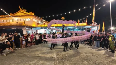 Dragon Dance Performance at Kampar Seng Fatt Temple at Night Stock Footage 345442462