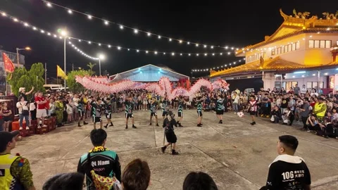 Dragon Dance Performance at Kampar Seng Fatt Temple During Deity Celebration Stock Footage 345444819