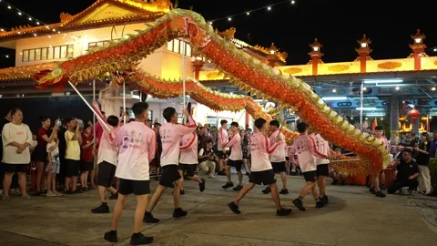 Dragon Dance Performance at Seng Fatt Temple in Kampar Stock Footage 345437913