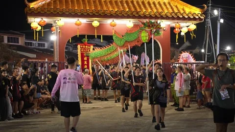 Dragon Dance Performance at Seng Fatt Temple in Kampar at Night Stock Footage 345439515