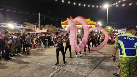 Dragon Dance Performance at Seng Fatt Temple in Kampar at Night Stock Footage 345442757