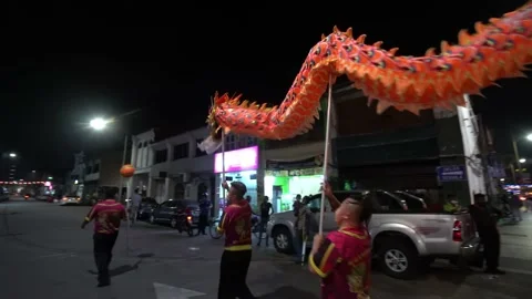 Dragon dance performance at street durin... | Stock Video | Pond5