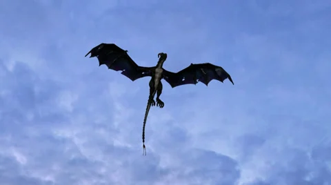 Dragon in flight on sky background Stock Footage 36563965