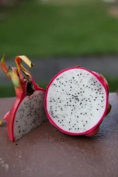 Dragon fruit cute in half and quarter Stock Photos