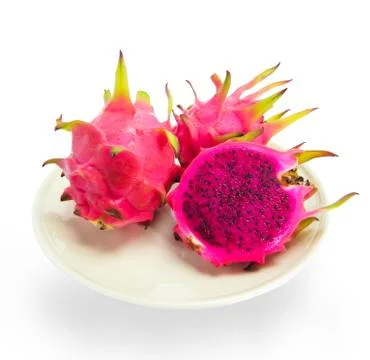 Dragon fruit on the dish isolated on white background Stock Photos