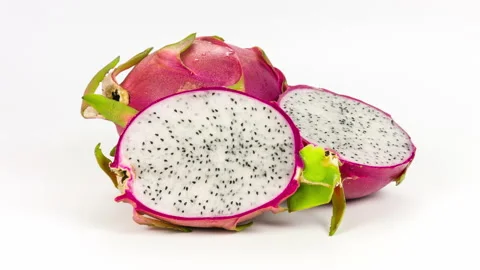 Dragon fruit isolated on white background close-up rotation Stock Footage 94733804