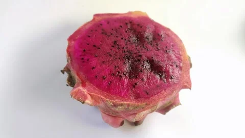 Dragon fruit, or pitaya, or Hylocereus spp is red on a white background. Stock Footage 297027809