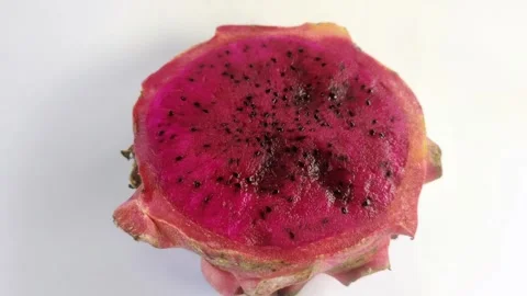 Dragon fruit, or pitaya, or Hylocereus spp is red on a white background. Stock Footage 297027811