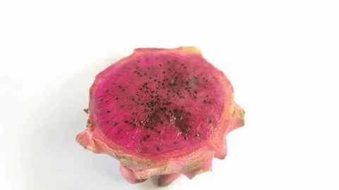 Dragon fruit, or pitaya, or Hylocereus spp is red on a white background. Stock Footage 297027816