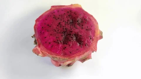 Dragon fruit, or pitaya, or Hylocereus spp is red on a white background. Stock Footage 297027817