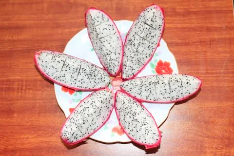 The dragon fruit on plate Stock Photos