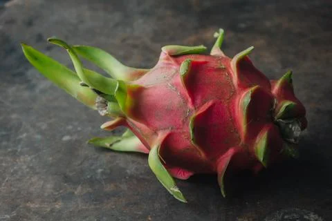 Dragon fruit on rustic background Stock Photos