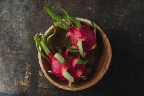 Dragon fruit on rustic background Stock Photos