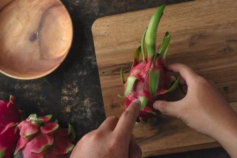Dragon fruit on rustic background Stock Photos