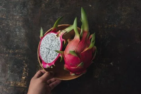 Dragon fruit on rustic background Stock Photos