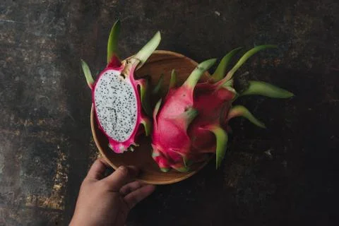 Dragon fruit on rustic background Stock Photos