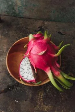 Dragon fruit on rustic background Stock Photos