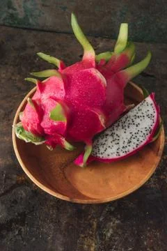 Dragon fruit on rustic background Stock Photos