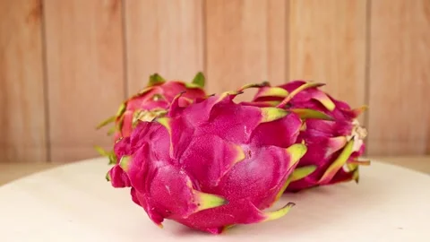 Dragon Fruit on Wooden Surface Stockbeeldmateriaal 310284102