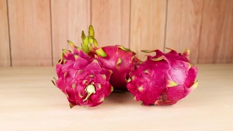 Dragon Fruit on Wooden Surface Stockbeeldmateriaal 316806667