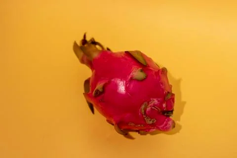 Dragon Fruit On yellow table, close up Stock Photos