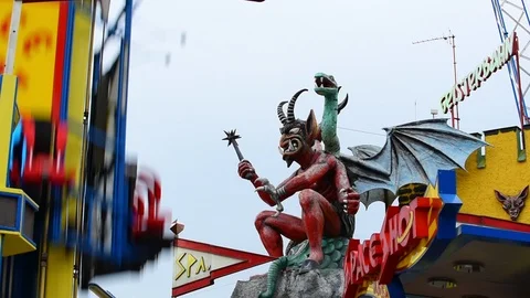 Dragon on a ghost house next to space shot, Prater, Vienna, Austria Stock Footage 110859909