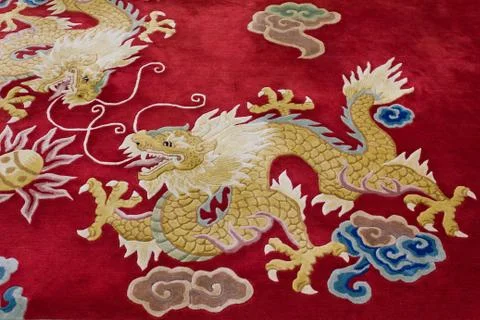 Dragon image on the carpet Stock Photos