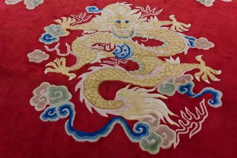 Dragon image on the carpet Stock Photos