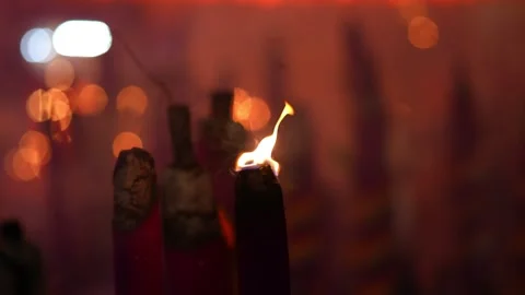 A dragon joss stick sends curls of smoke, invoking tradition and spirit. Видео 314389308