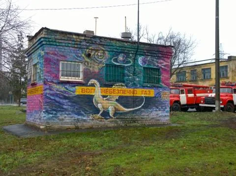 A dragon painted on a wall symbolizing fire hazard Stock Photos