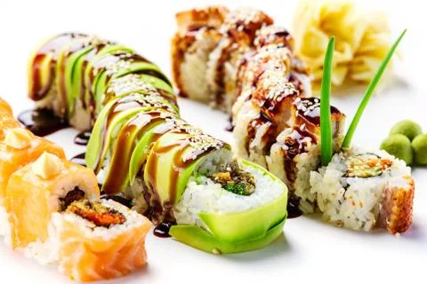 Dragon rolls over white background Stock Photos