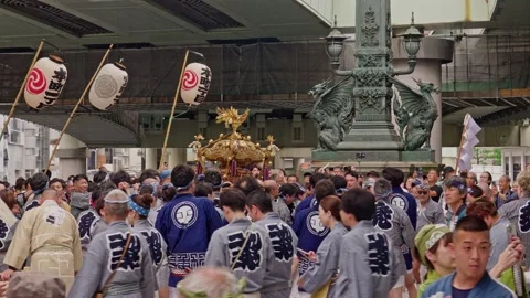 Dragon-Sculpted Bronze Monument Rises Above Festival Crowd Stock Footage 342042225