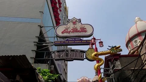 Dragon Statue Beside Eng Bee Tin Signboard in Binondo Manila Stock Footage 236181922
