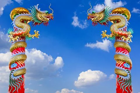 Dragon statue with the blue sky field. Stock Photos