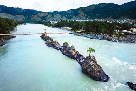 Dragon Teeth Rocks on Katun. Sharp triangular rocks in the bed of a mountain  Stock Photos
