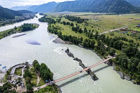Dragon Teeth Rocks on Katun. Sharp triangular rocks in bed of a mountain ri.. Stock Photos